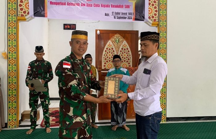 Danpos RI-PNG Yonif 141 Trisula Bersama Muspika Distrik Haju Peringati Maulid Nabi