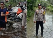 Bhabinkamtibmas Polsek Dedai bantu pengaturan lalu lintas dan pengendara sepeda motor di area banjir Desa Lundang Baru