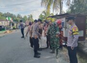 Peringatan Hari Sampah Nasional 2026, Koramil dan Polsek Paloh Bersihkan Pantai Tanah Hitam Sambas