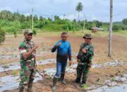 Tingkatkan Ketahanan Pangan, Personel Kodim 1310/Bitung Lakukan Perawatan Tanaman dan Ternak di Lokasi Kompi Produksi