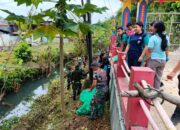 Karya Bakti Kodim 1209/Bengkayang Bersihkan Pasar Bengkayang, Wujudkan Lingkungan Bersih dan Sehat