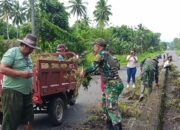 Sinergi TNI dan Warga, Koramil 04/Dimembe Gelar Karya Bakti Bersihkan Akses Jalan Desa Wasian